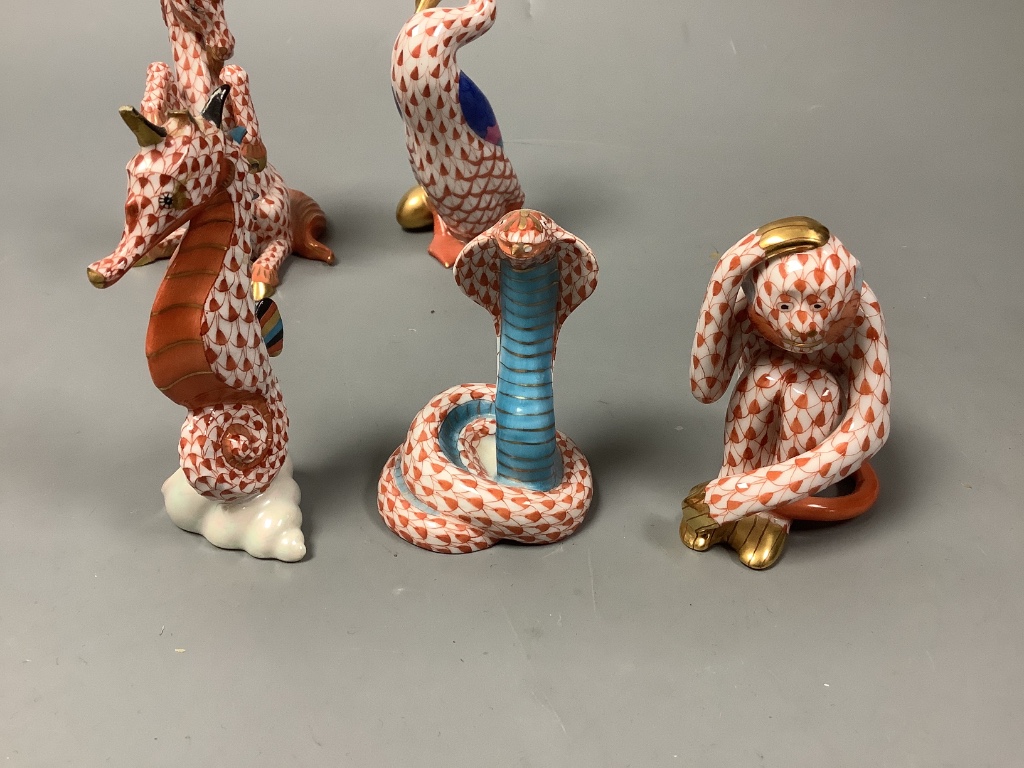 Fourteen various Herend red ‘fishnet’ animals models,